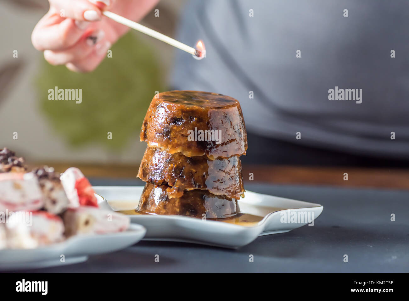 Closeup View Female Hands Lighting Up Christmas Pudding Stock Photo Alamy