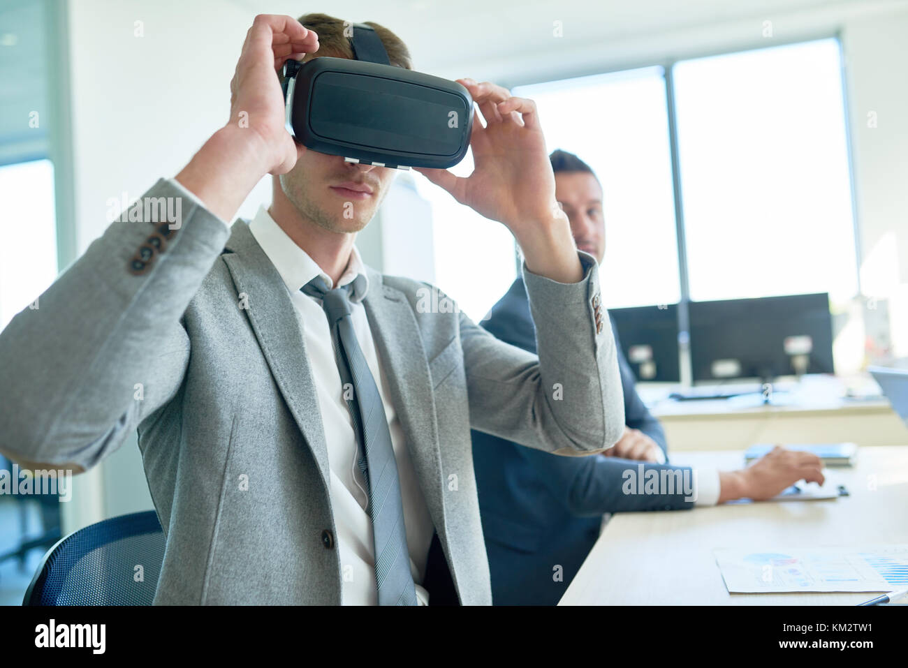 Handsome Businessman Using VR Glasses Stock Photo - Alamy