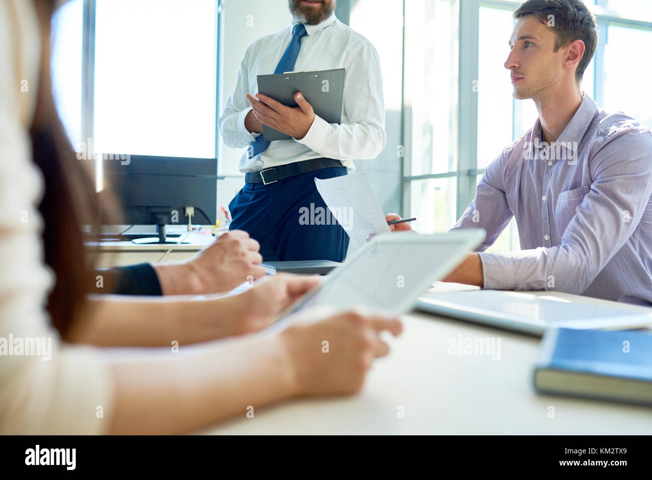 Modern Entrepreneurs Planning Projects in Meeting Stock Photo