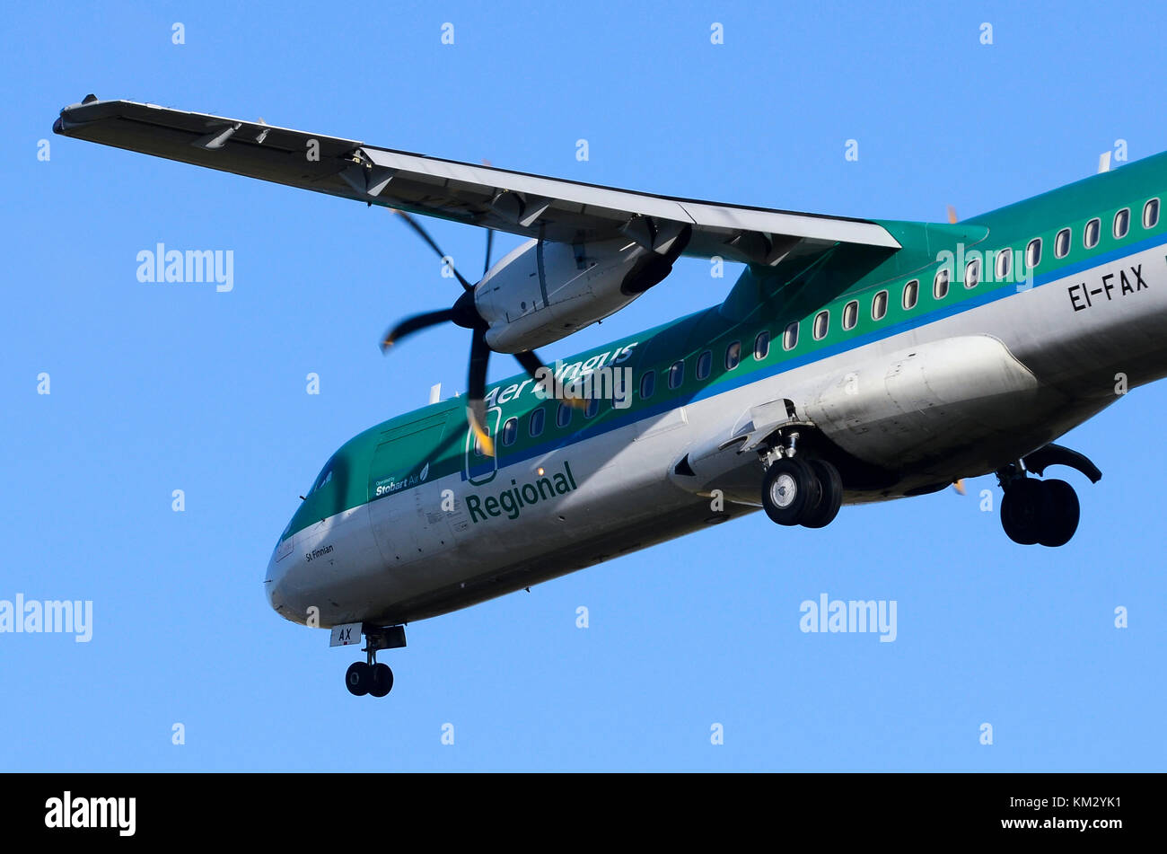 ATR 72 operated by Stobart Air on behalf of Aer Lingus Regional, Birmingham Airport, UK. ATR 72-600 EI-FAX St. Finian is seen on approach for landing. Stock Photo