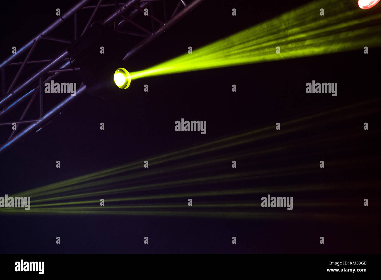 Green stage lights. Illumination with spotlights at a concert Stock