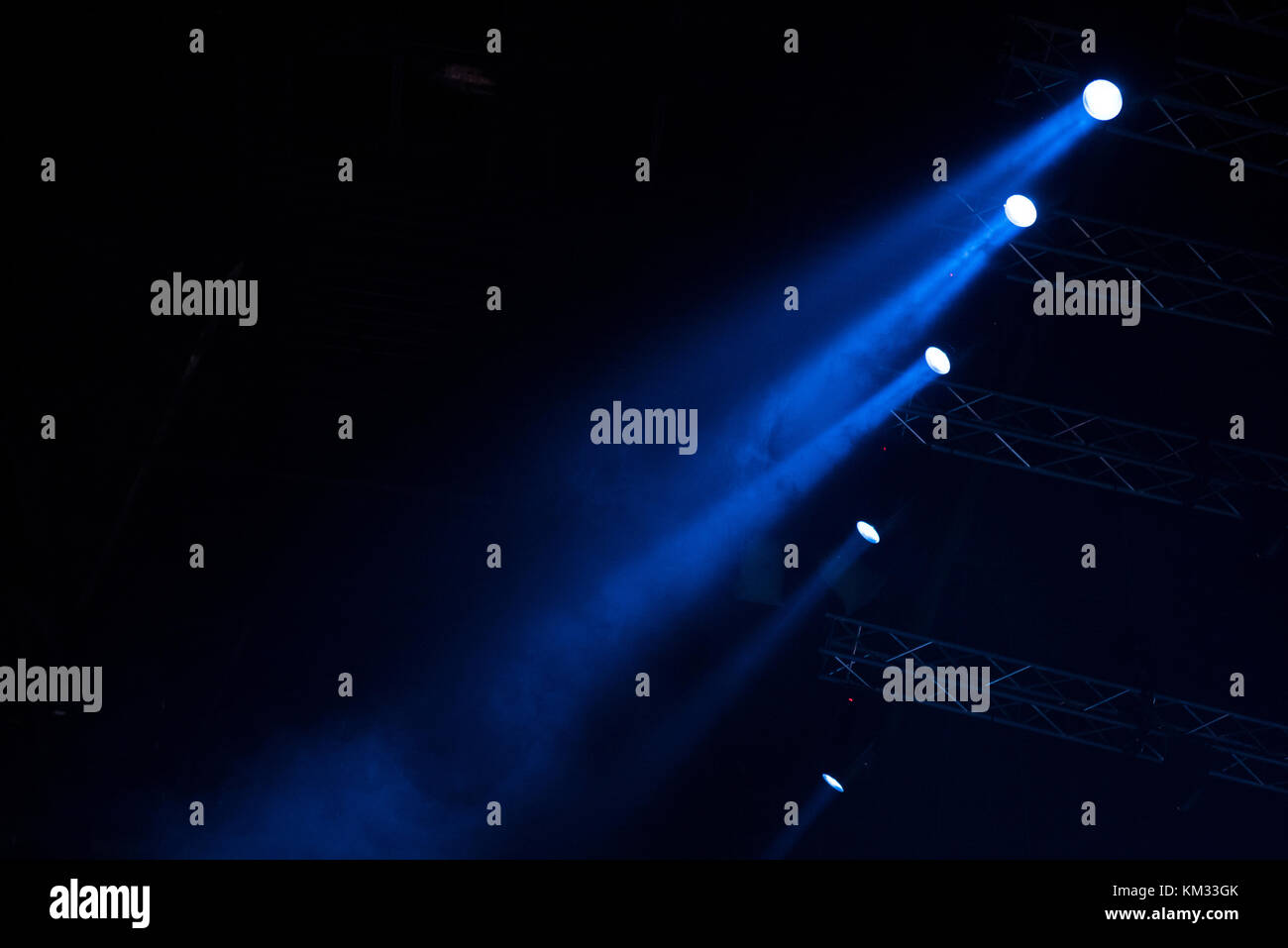 Blue stage lights. Illumination with spotlights at a concert Stock Photo