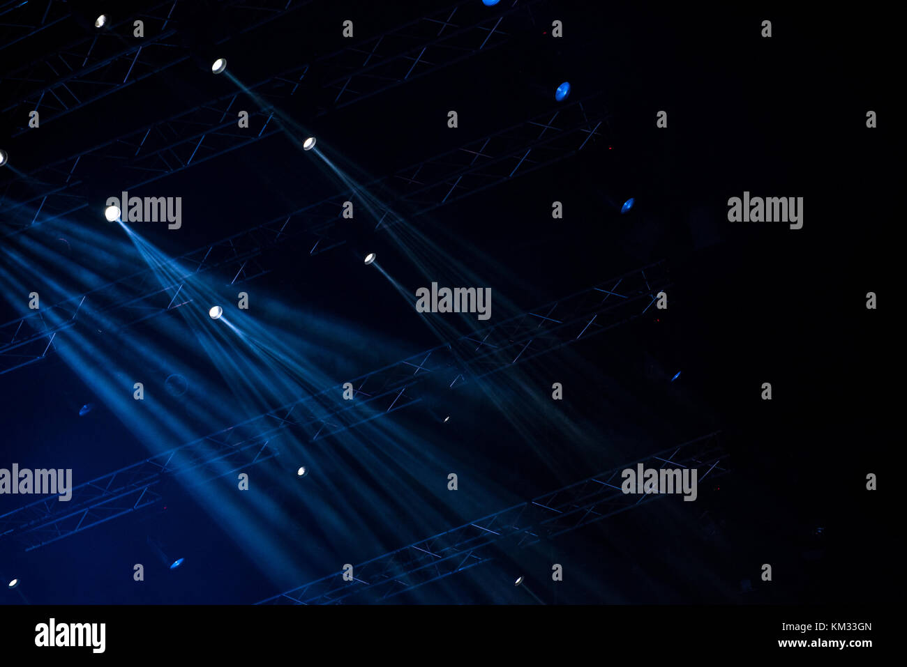 Blue stage lights. Illumination with spotlights at a concert Stock Photo