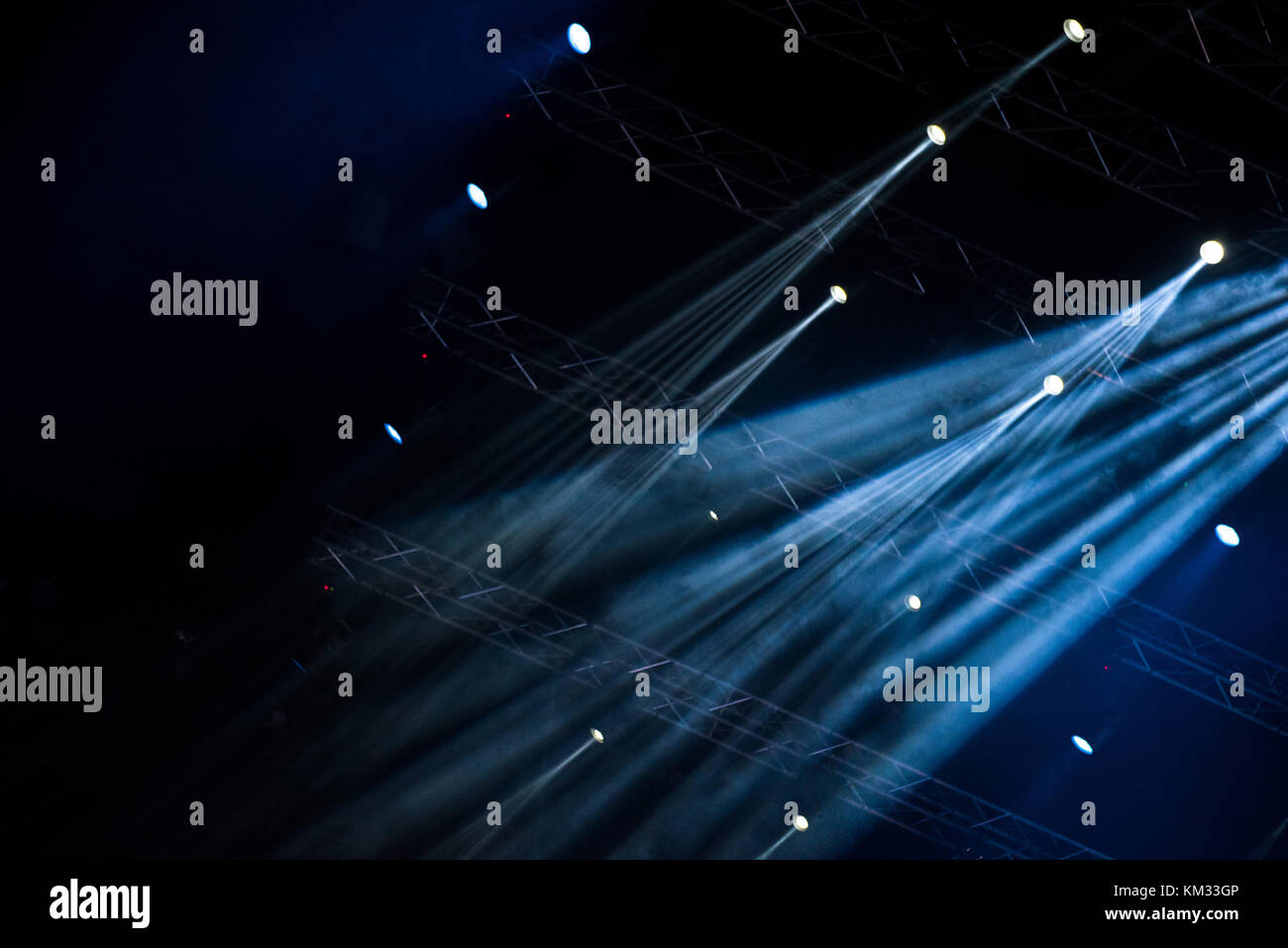 Blue stage lights. Illumination with spotlights at a concert Stock Photo