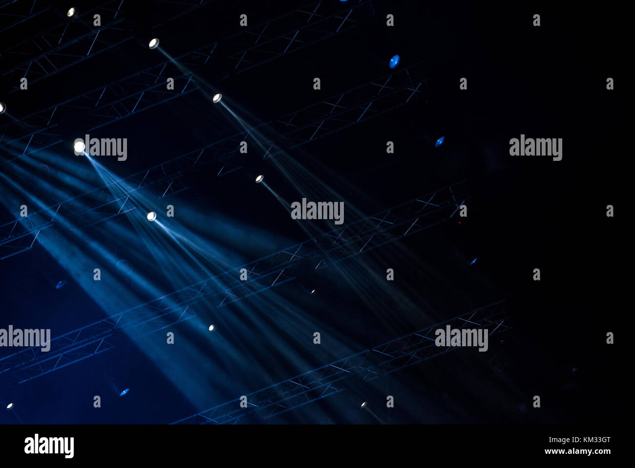 Blue stage lights. Illumination with spotlights at a concert Stock Photo