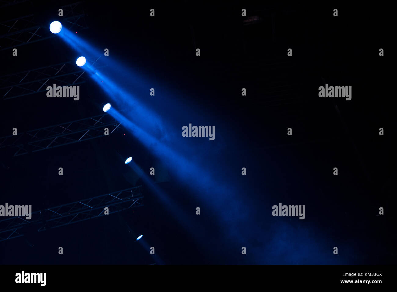 Blue stage lights. Illumination with spotlights at a concert Stock Photo