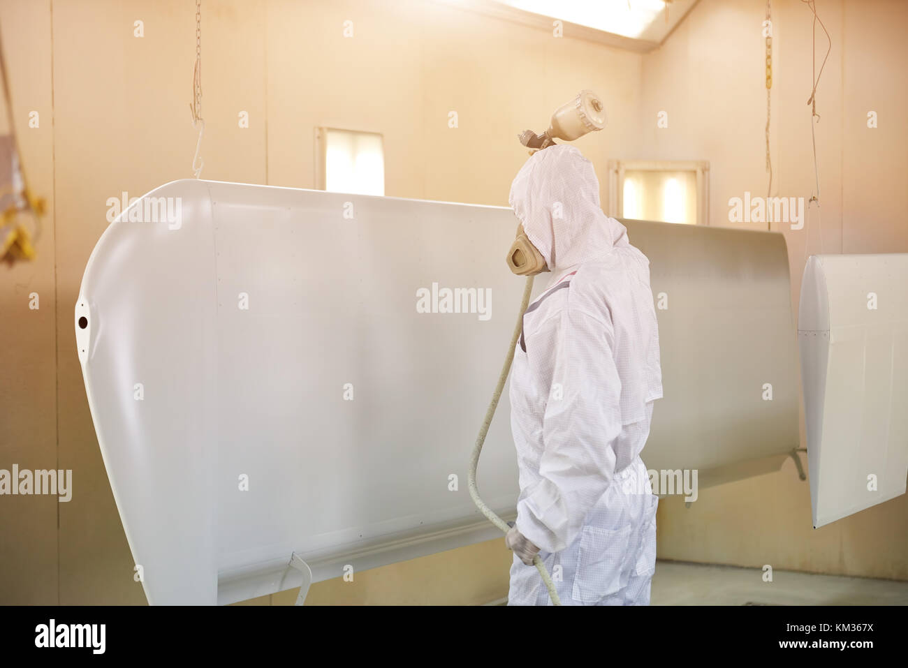 Airplane wing, spray painting Stock Photo Alamy