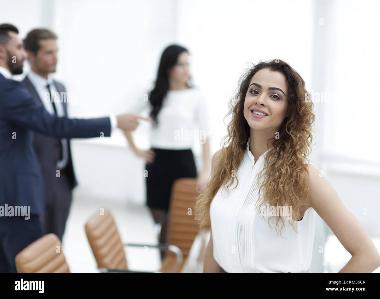 business woman on the background of business team Stock Photo - Alamy