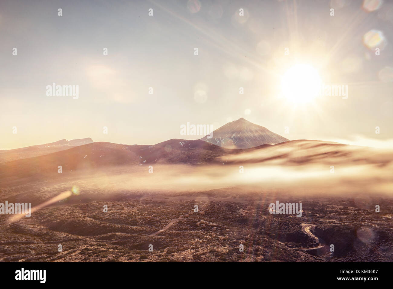 Sun flare over mountain hi-res stock photography and images - Alamy