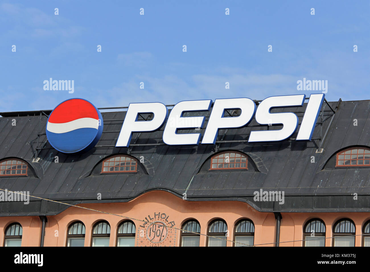 HELSINKI, FINLAND - MAY 20, 2014: Sign Pepsi in central Helsinki. Pepsi production began in the USA in 1898, and the beverage entered the Finnish mark Stock Photo