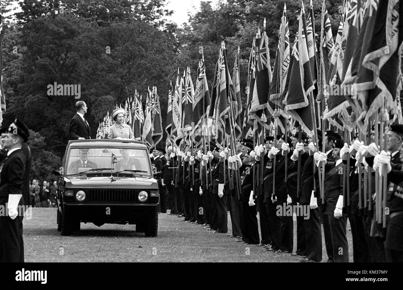 Queen Elizabeth II and Prince Philip, Duke of Edinburgh, in the Royal Land Rover amongst a sea of Standards when she took the Royal British Legion Review at Windsor Castle. Stock Photo