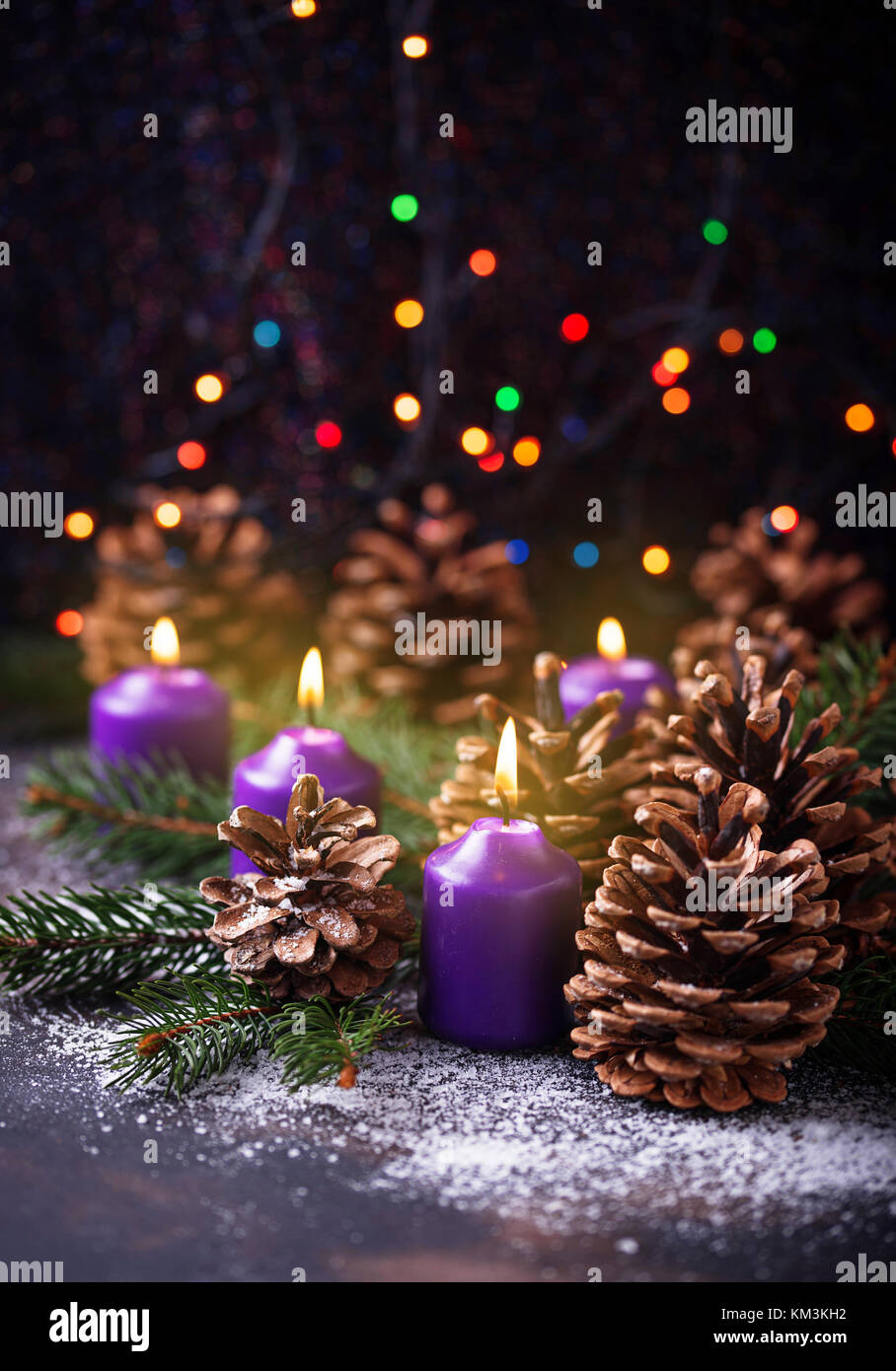 Pine cones and candle Stock Photo - Alamy