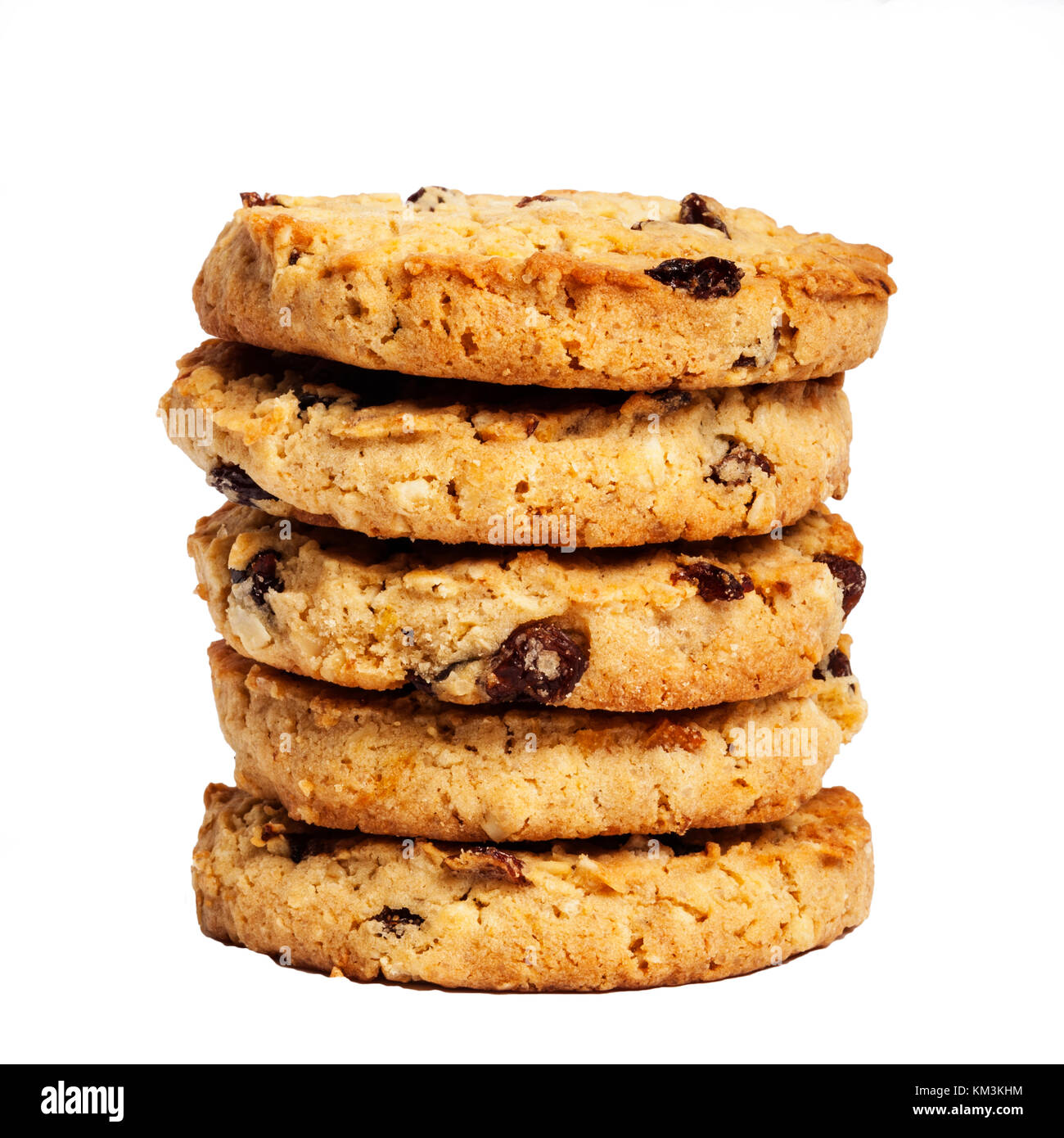 A stack of Fruit and Oat Cookies on a white background Stock Photo
