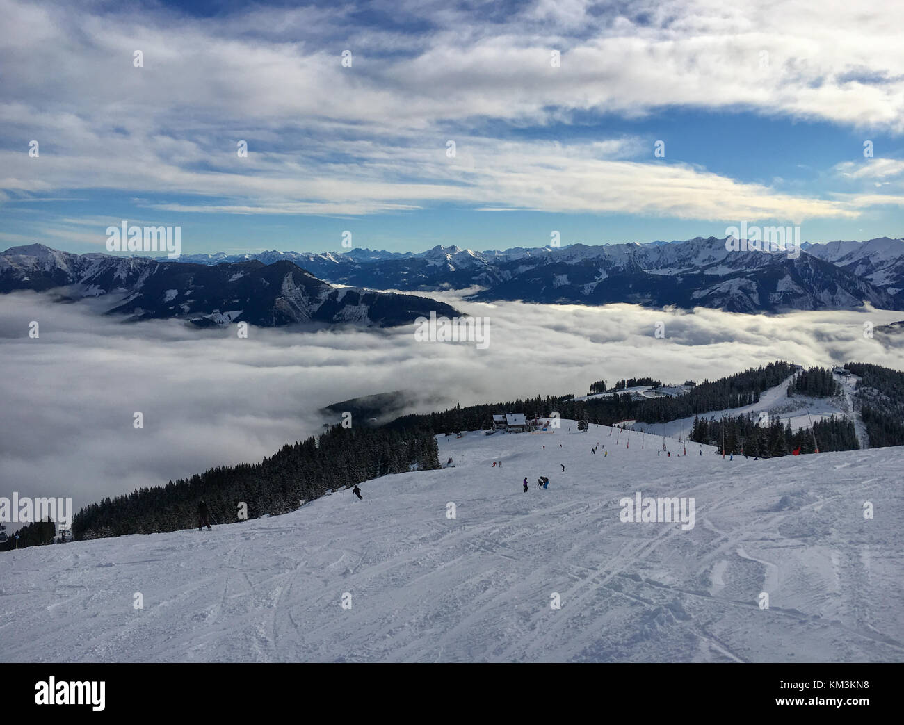 Panoramic view at mountains and ski run at the Austrian ski area Schmitten in the tyrolean alps Stock Photo