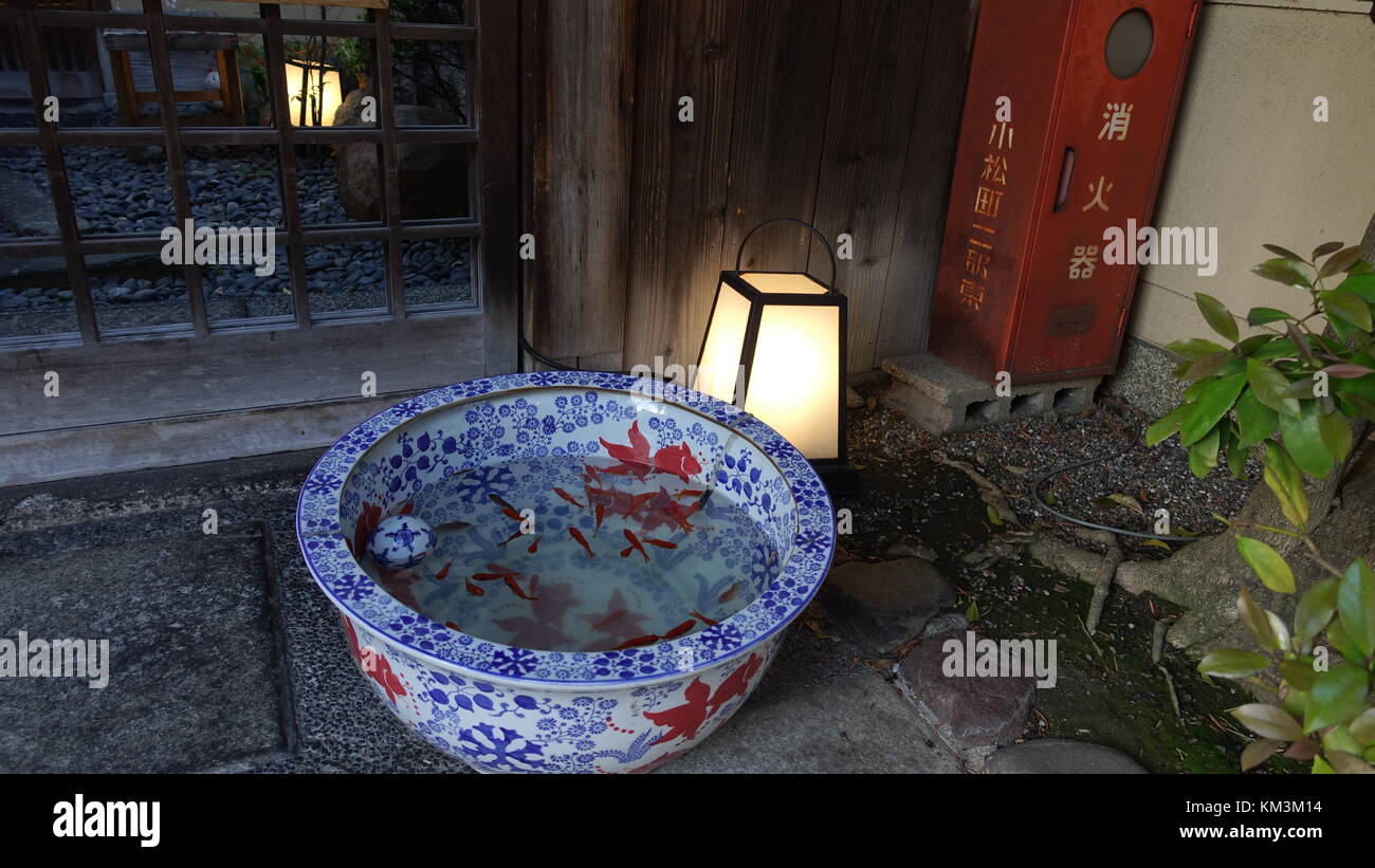 Kyoto Japan ceramic fish bowl in garden Stock Photo