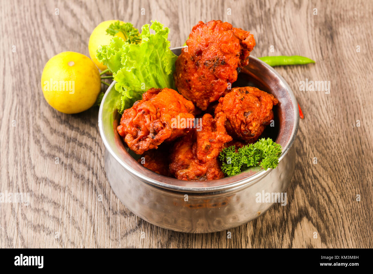 Indian traditional cuisine Chicken lollipops with spices Stock Photo