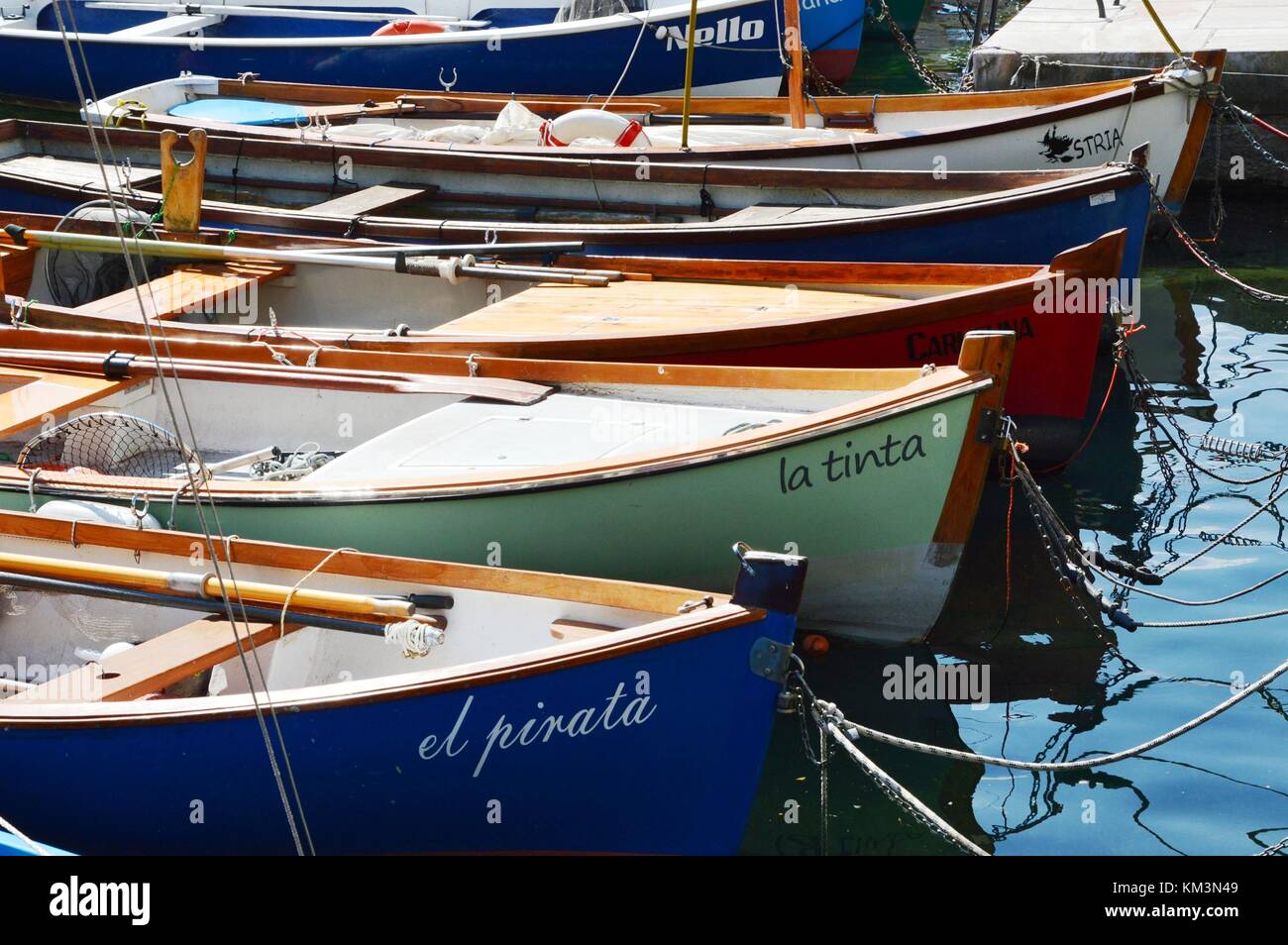 Fishing boats at the port of Torbole in Garda lake, Italy, sept 09 2016 ...