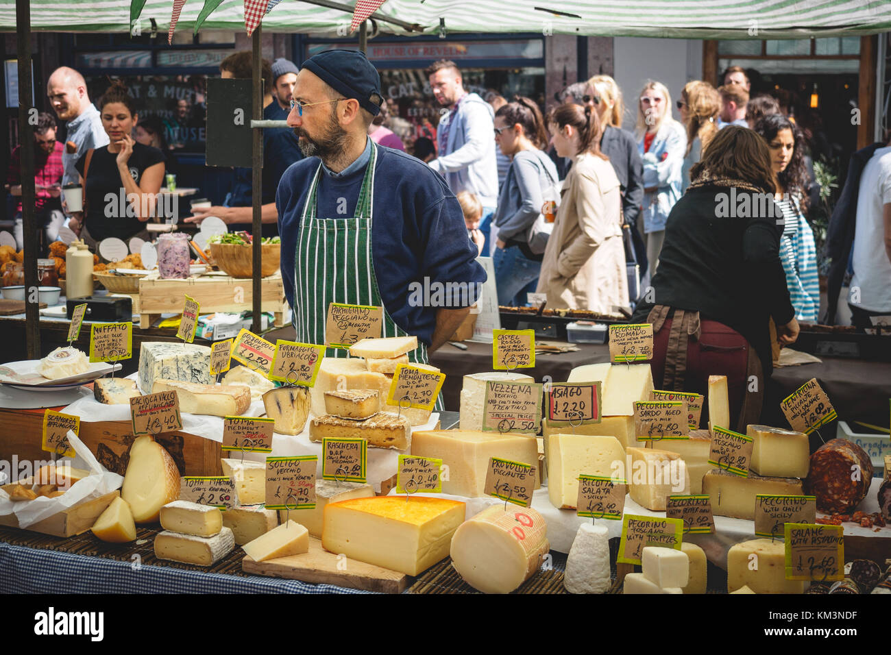 Street food stall selling cheese in Broadway Market in Hackney. East London (UK), August 2017