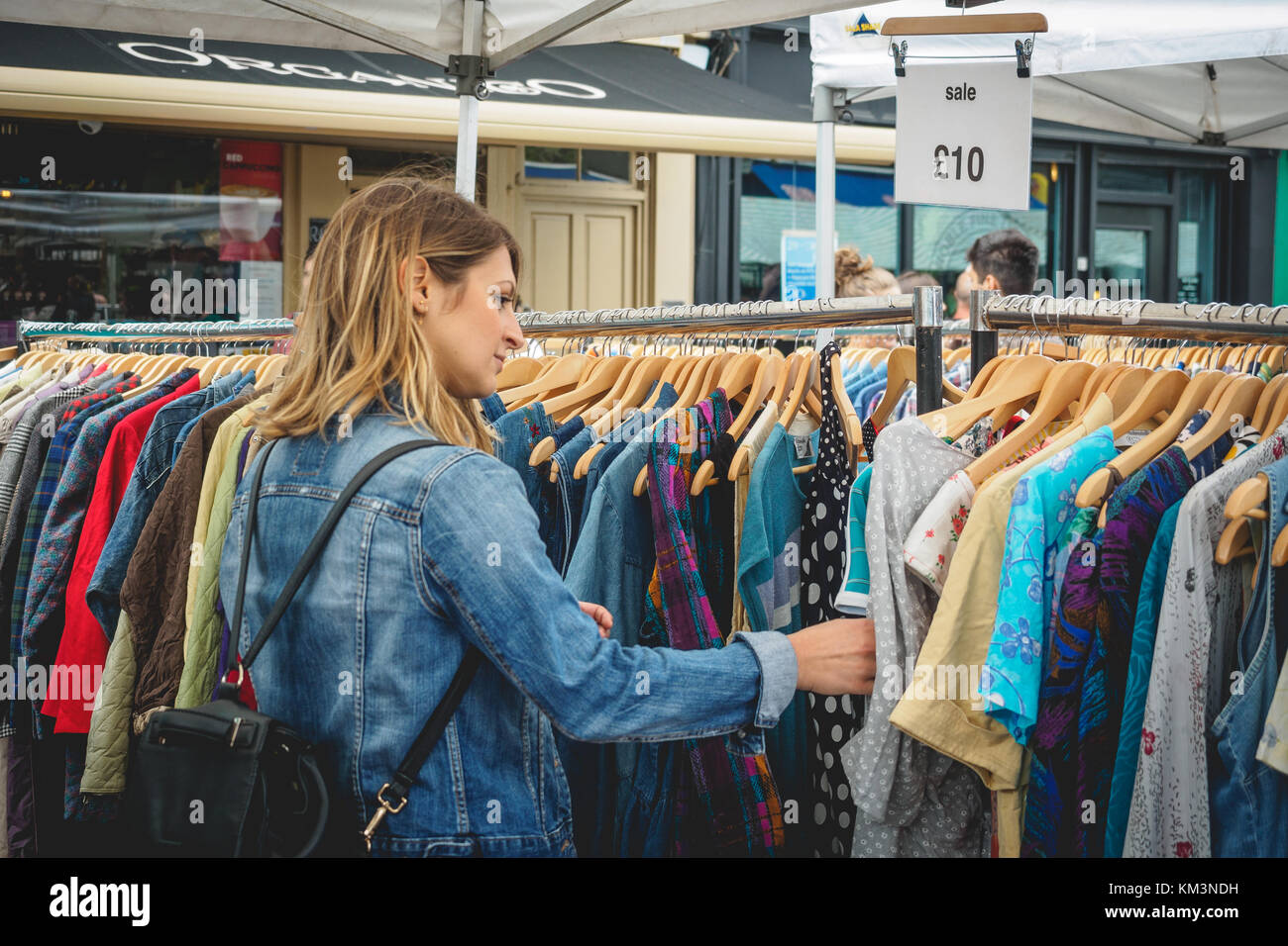 Vintage clothes stall in Broadway Market. East London (UK), August 2017. Landscape format. Stock Photo