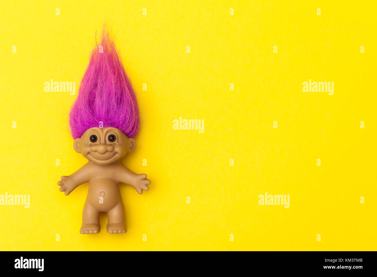 LONDON, UK - DECEMBER 4th 2017: An original troll plastic toy figure with bright coloured hair. First produced in Denmark by Thomas Dam Stock Photo