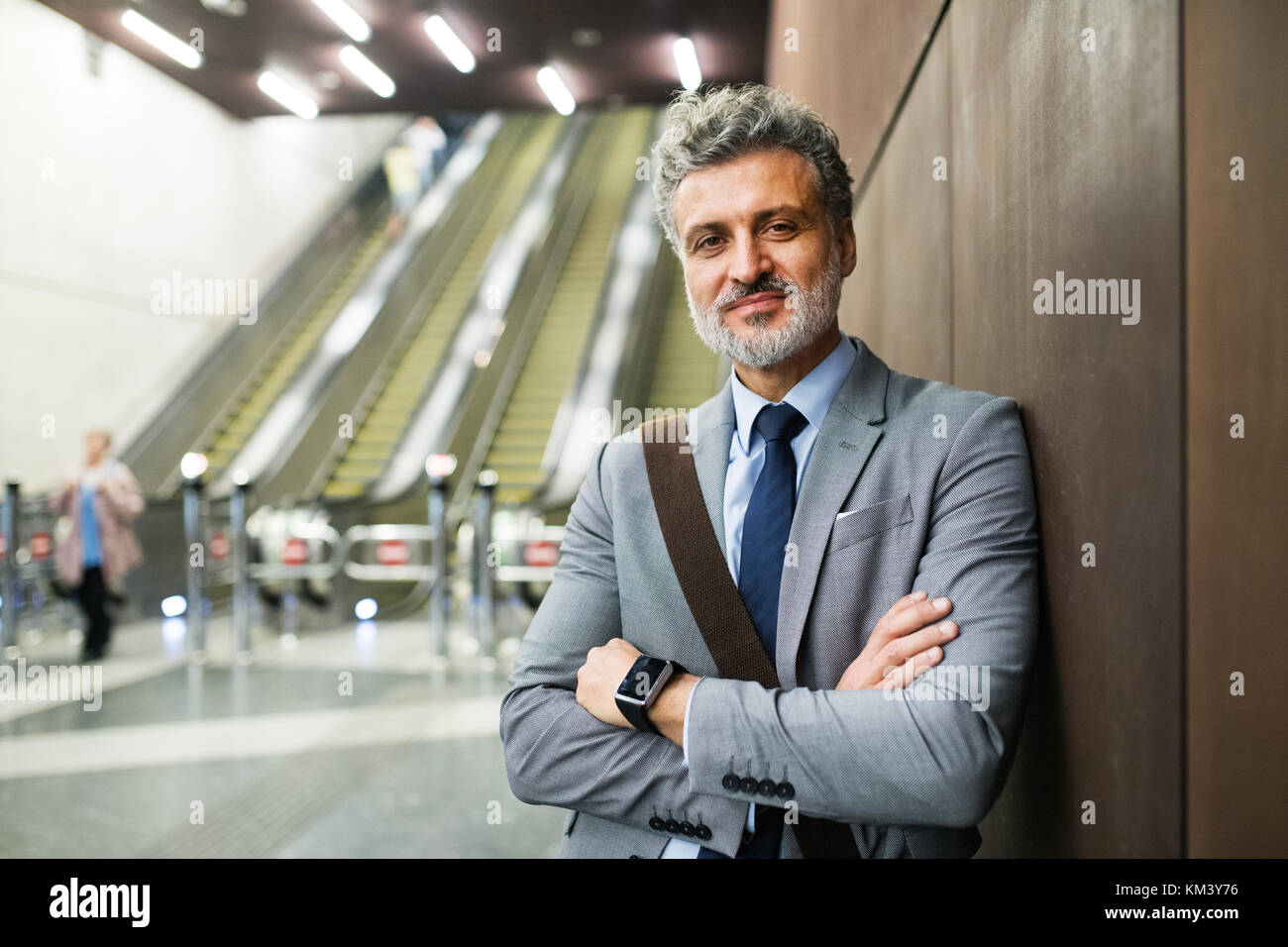 Mature businessman on a metro station. Stock Photo