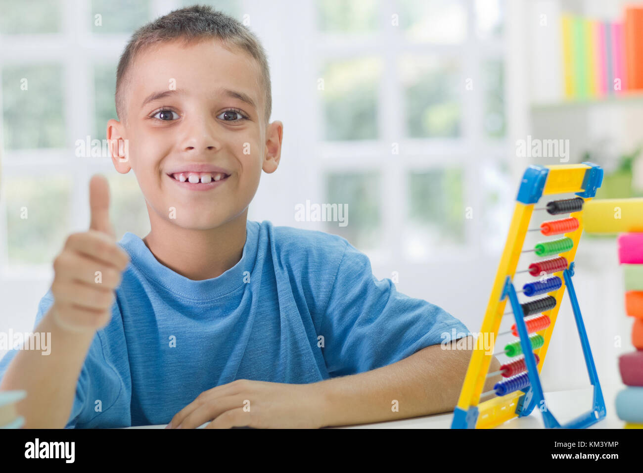 happy school boy with thumb up Stock Photo - Alamy