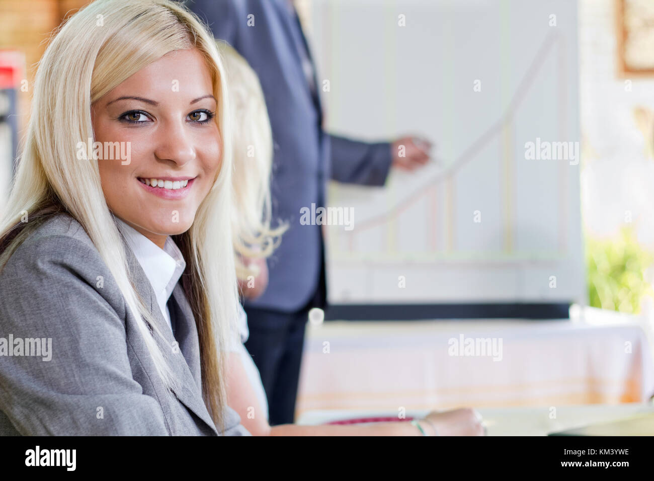 Blonde woman in business suit hi-res stock photography and images - Alamy