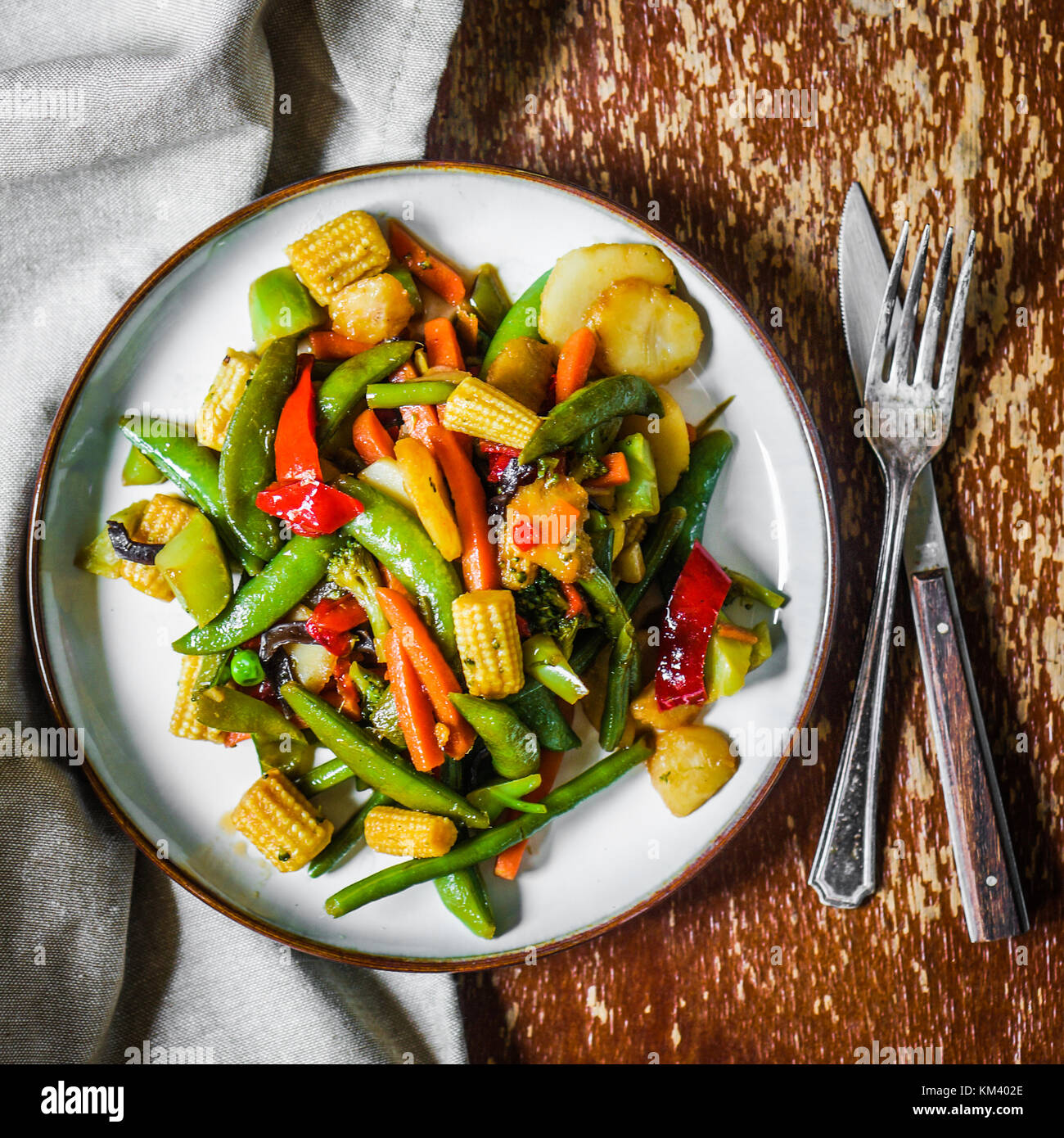 Baked Vegetables On Rustic Background Stock Photo - Alamy