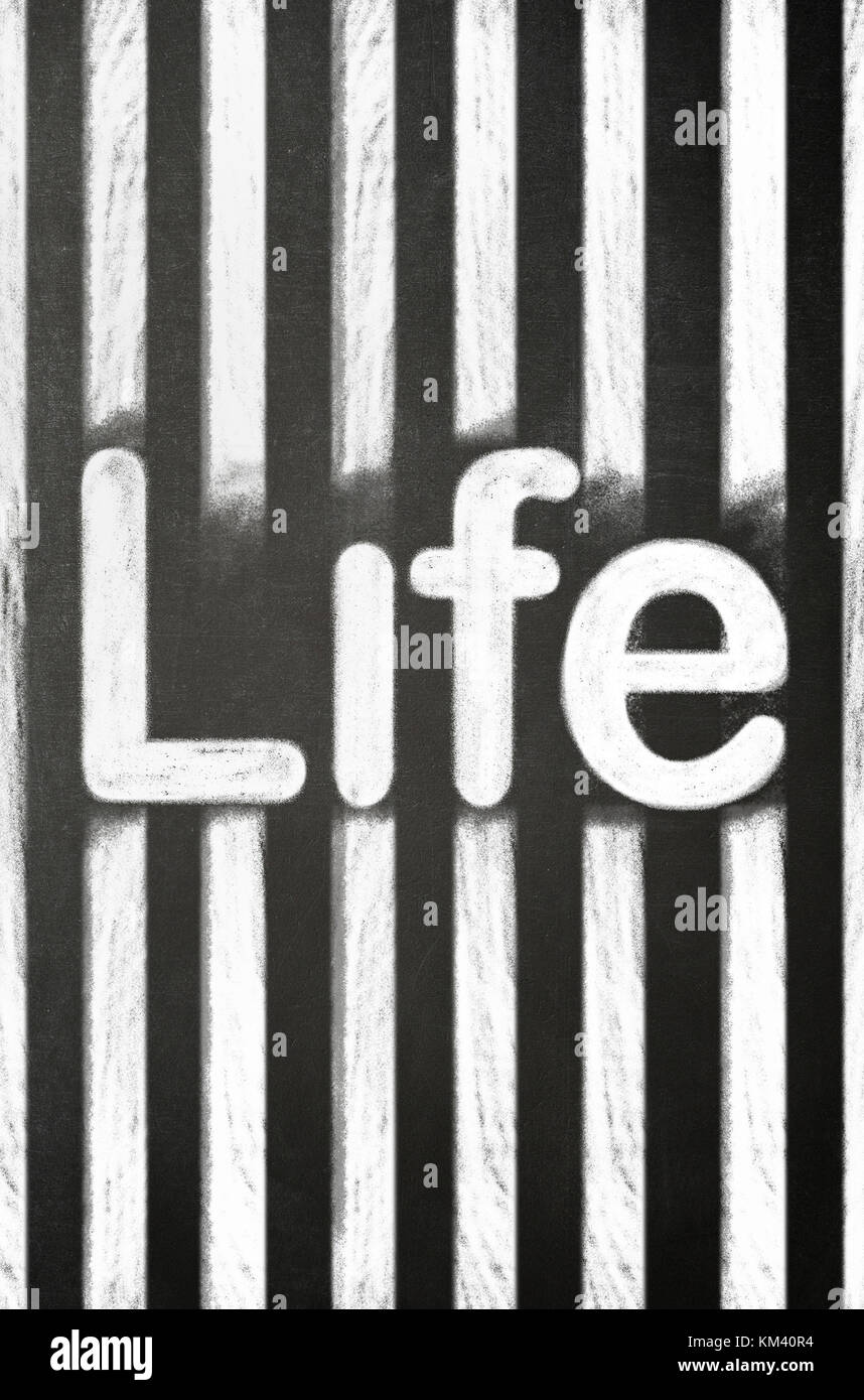 PRISON Life Sentence CONCEPT. The word LFE with cell bars drawn in chalk on a blackboard. Stock Photo