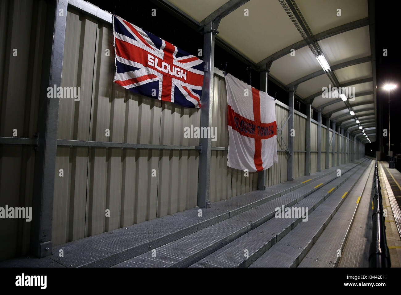 General view of Slough Town flags before the Emirates FA Cup, Second Round match at Arbour Park, Slough. Stock Photo