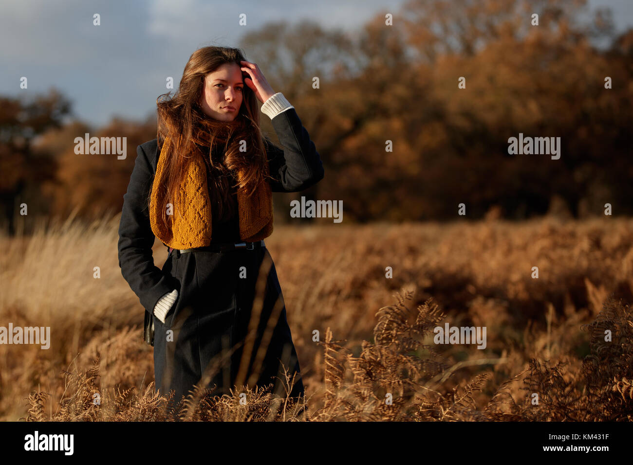 Young woman walking in a countryside park Stock Photo - Alamy