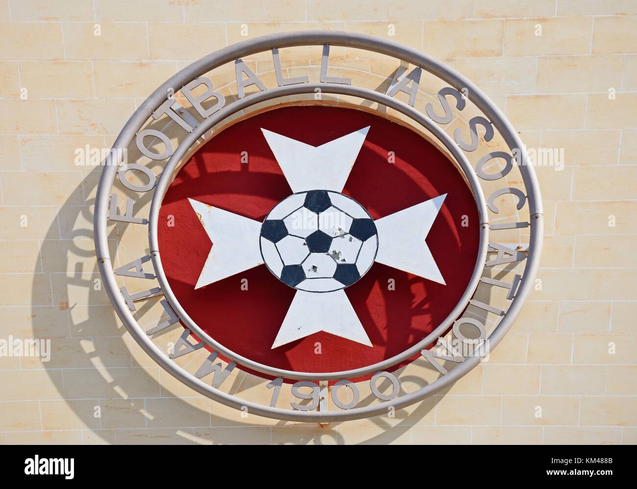 Malta football association emblem on the front of the Centenary Stadium