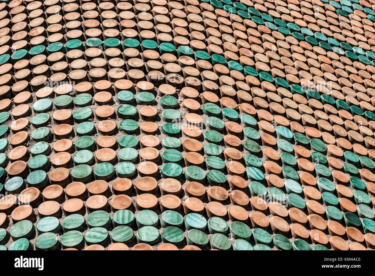 vietri sul mare (amalfi coast, italy): colorful mosaic pattern on exterior facade, wave shape with pink and green circles elements Stock Photo