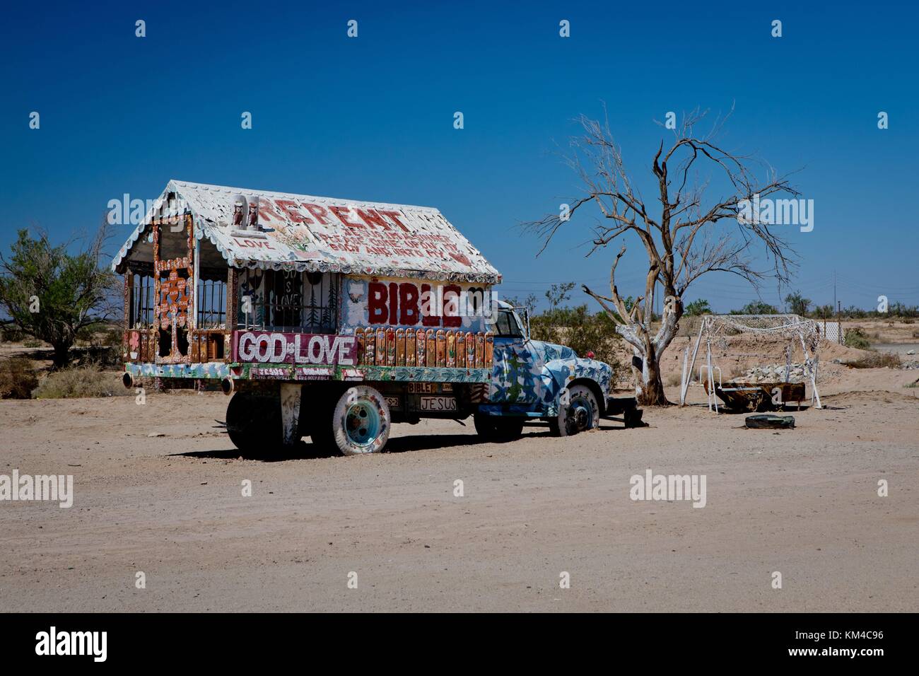 Truck plastered with bible verses, at the salvation Mountain in the Colorado Desert, dedicated to God and love, created by Leonard Knight, in September 2017. | usage worldwide Stock Photo