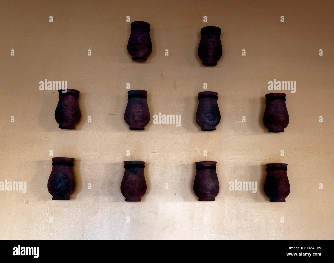 10 plant port vases on a wall at the Marriott Hotel San Jose, Costa Rica Stock Photo