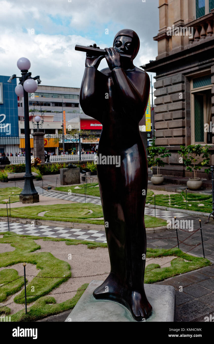 Statue of a piper (PAN) outside The National Theatre of costa Rica Stock Photo