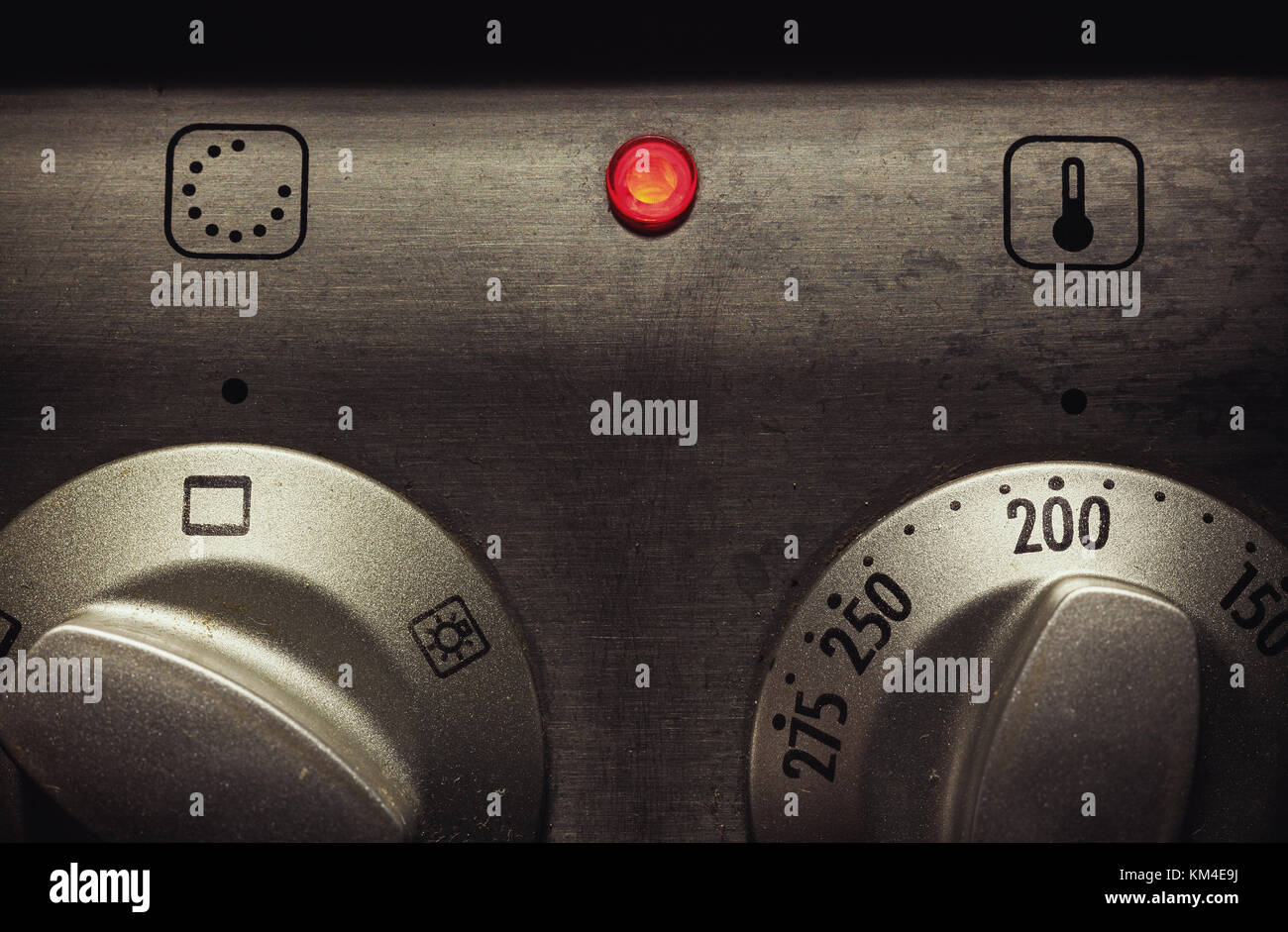 Closeup view on oven control buttons for heat and temperature. Stock Photo