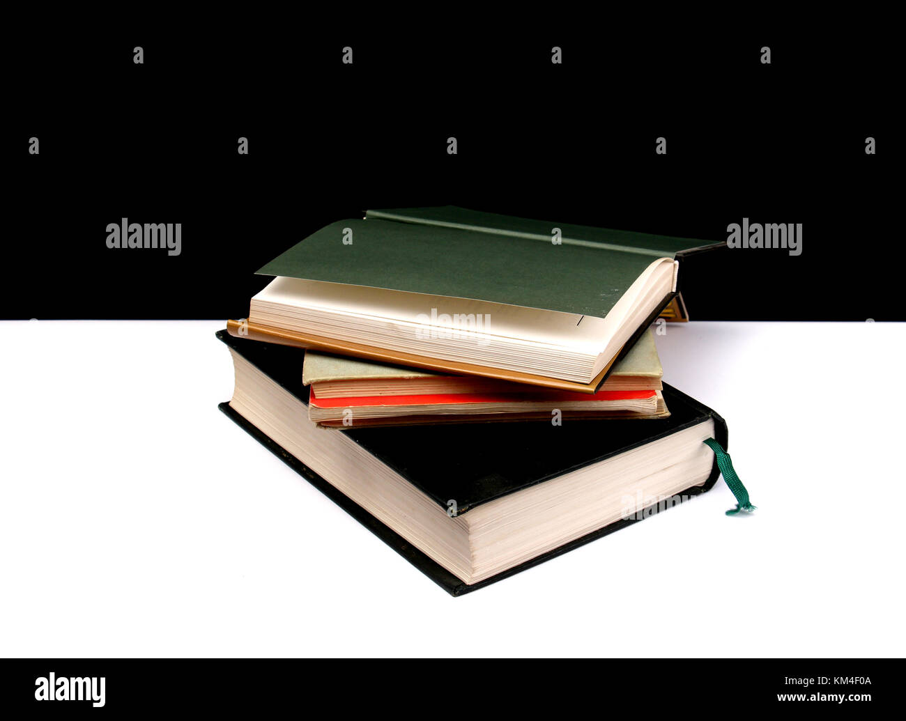 various colored books on a black and white background,image of a Stock ...