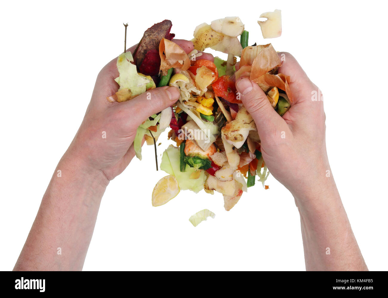 A beggar homeless man digging in a pile of food waste in a dump. Isolated on white concept top view shot Stock Photo