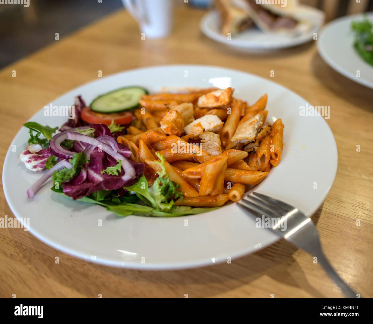 Fresh Delicious Food on White Plate, Kitchen Setting Stock Photo