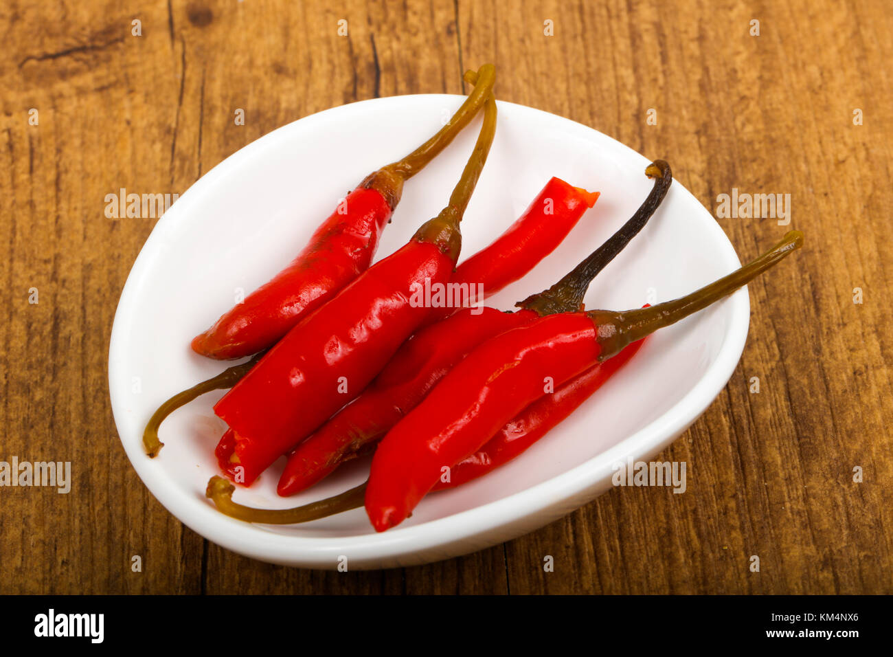 Pickled chili peppers Stock Photo - Alamy