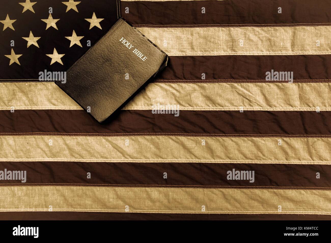 American Flag And Bible. Vintage American flag and King James Christian Holy Bible. Stock Photo
