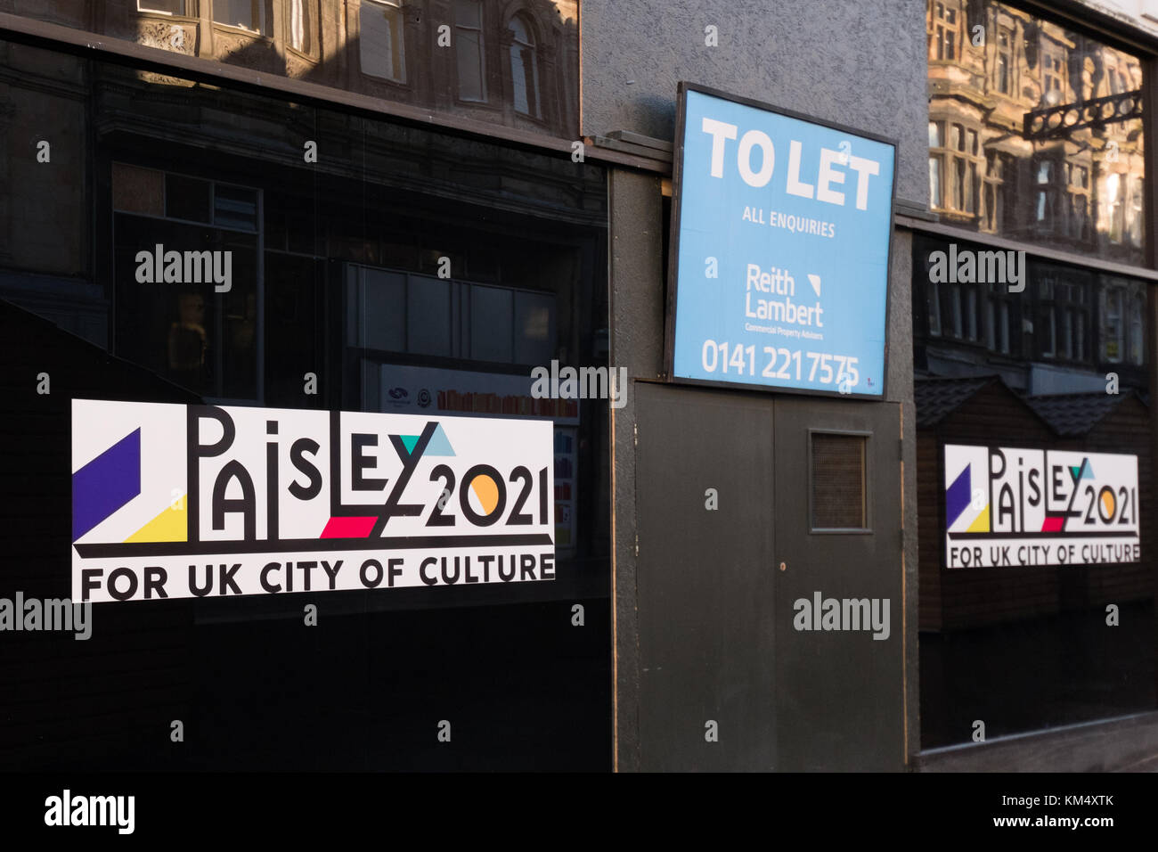 Paisley for UK City of Culture 2021 sign, next to To Let sign - Paisley, Scotland, UK Stock Photo