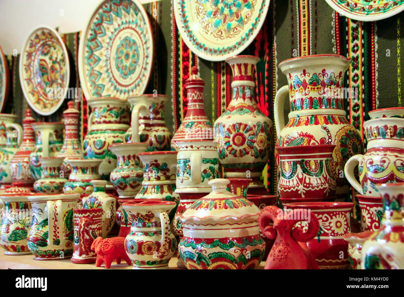 earthenware on the shelves of pottery shop Stock Photo - Alamy