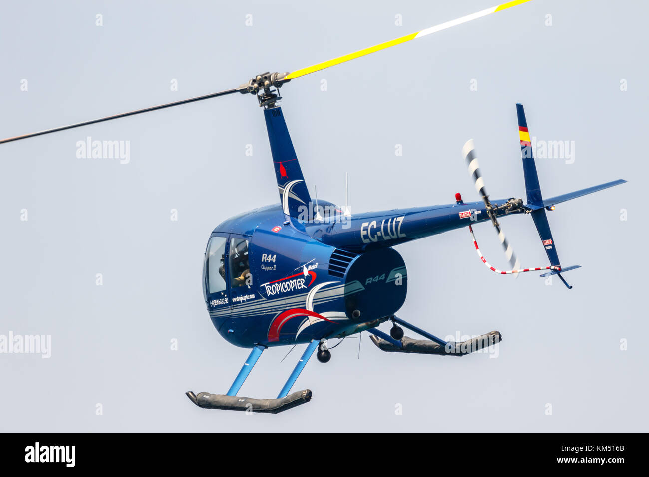 MOTRIL, GRANADA, SPAIN-JUN 11: Helicopter Robinson R44 taking part in an exhibition on the 12th international airshow of Motril on Jun 11, 2017, in Mo Stock Photo