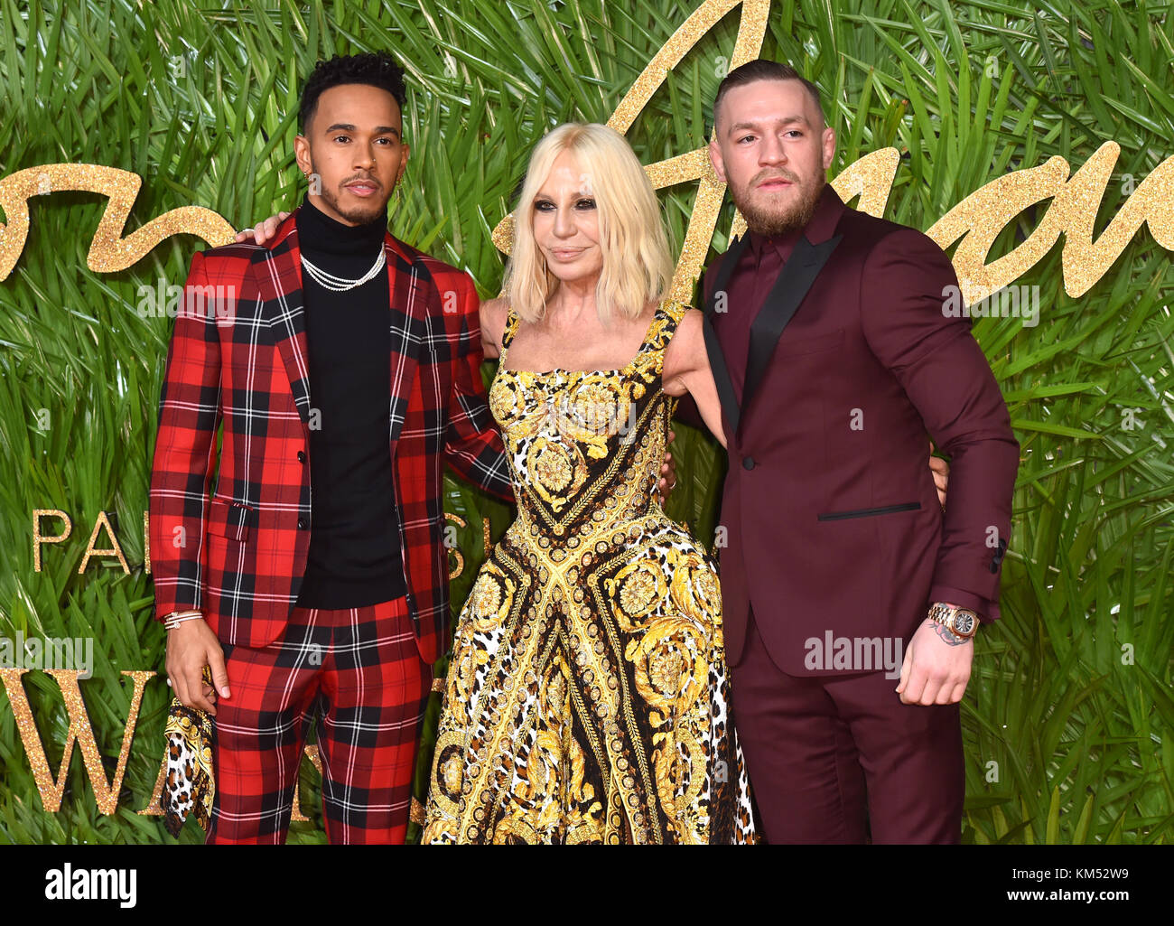 Lewis Hamilton, Donatella Versace and Conor McGregor attending the Fashion  Awards 2017, in partnership with Swarovski, held at the Royal Albert Hall,  London. Picture Date: Monday 4th December, 2017. Photo credit should