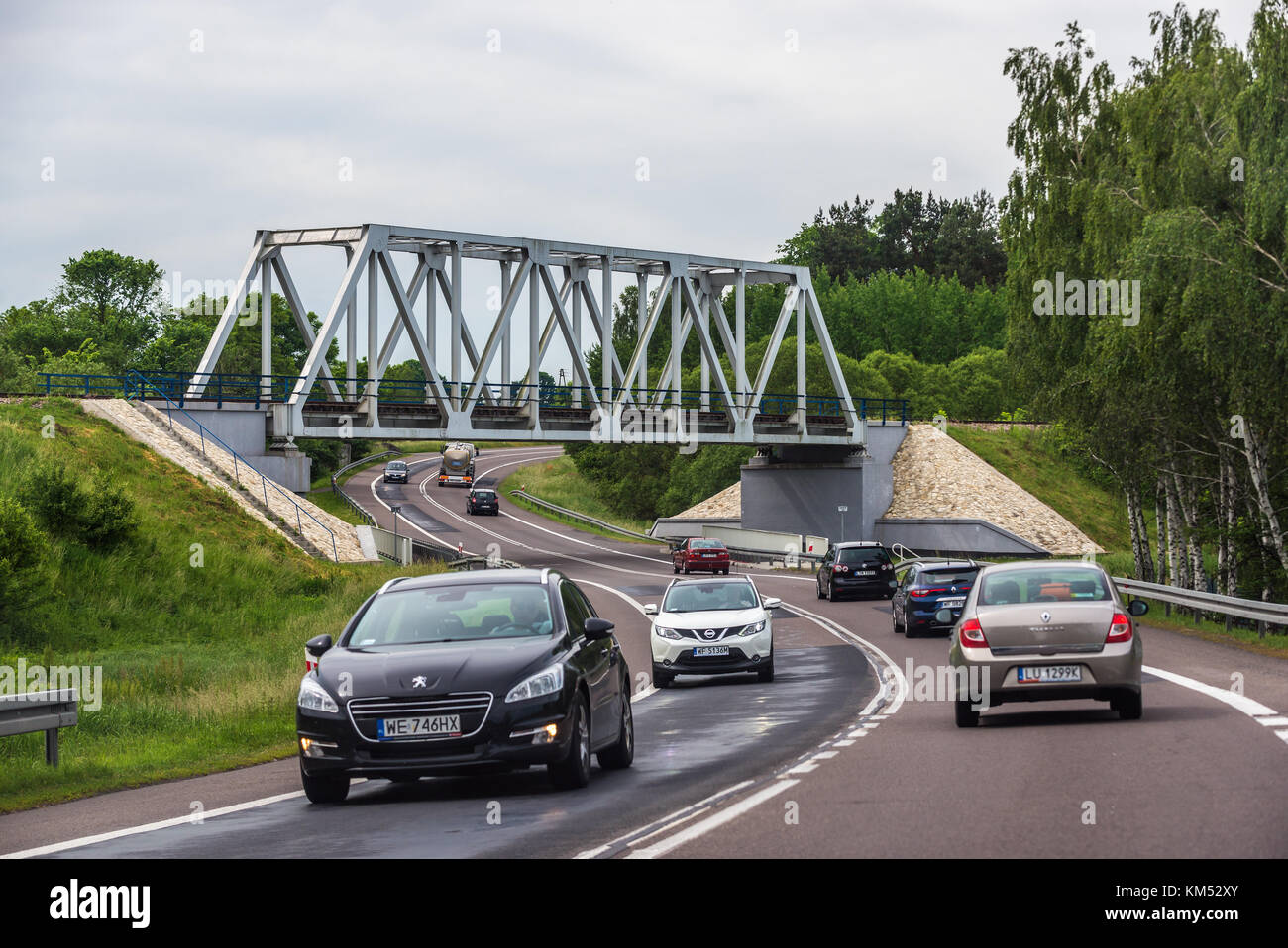 Railway bridge over road in Lublin Voivodeship, Poland Stock Photo