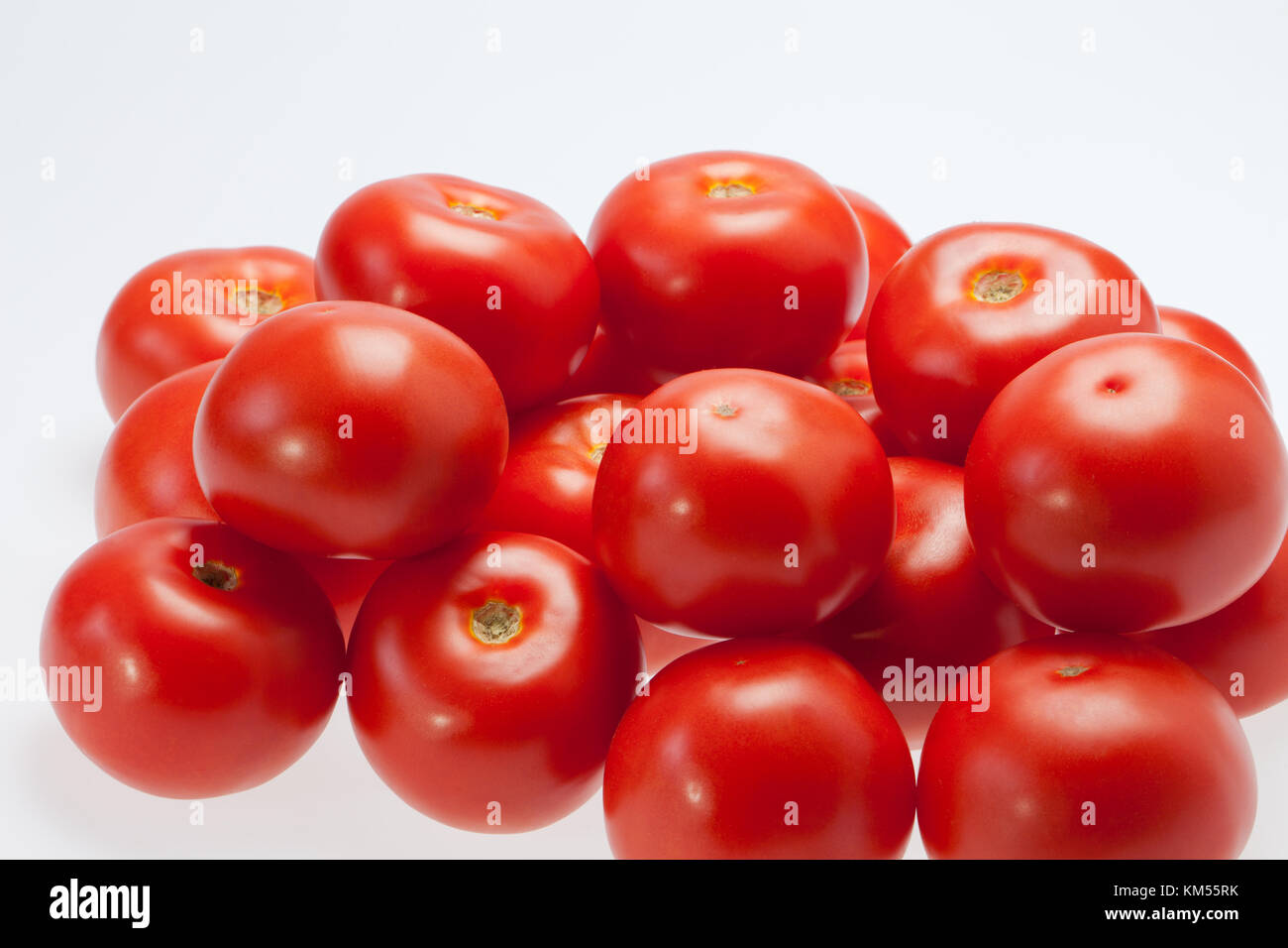 Fresh Tomatoes isolated on white Stock Photo - Alamy