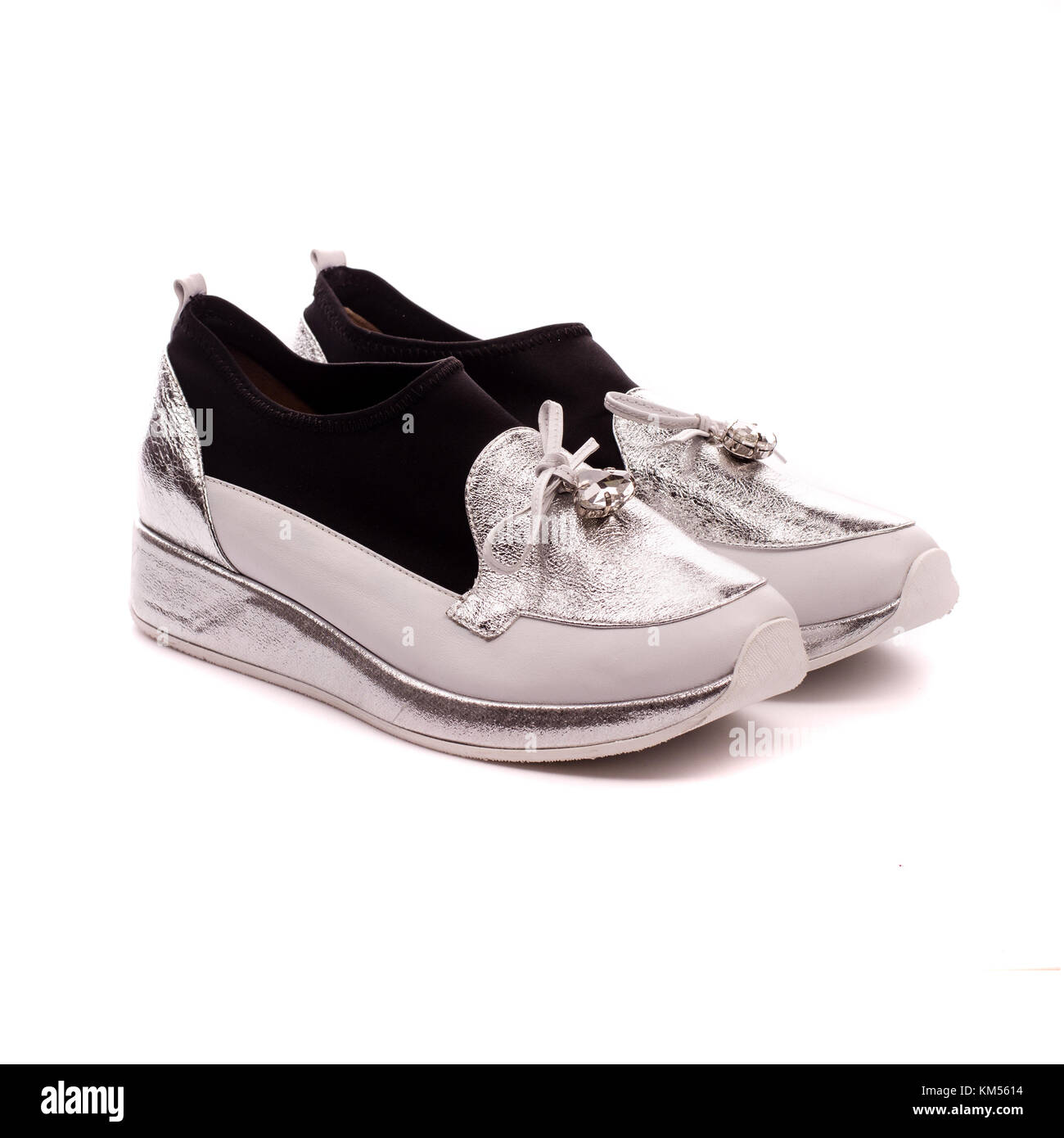women's sports shoes isolated on white background Stock Photo - Alamy
