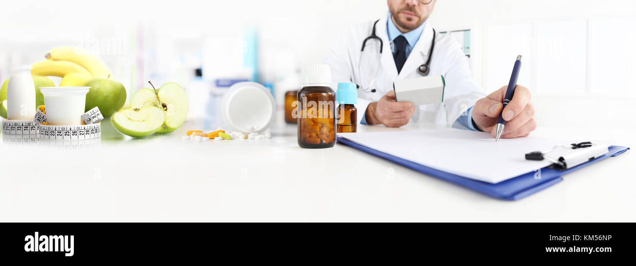 Nutritionist doctor writes the medical prescription for a correct diet